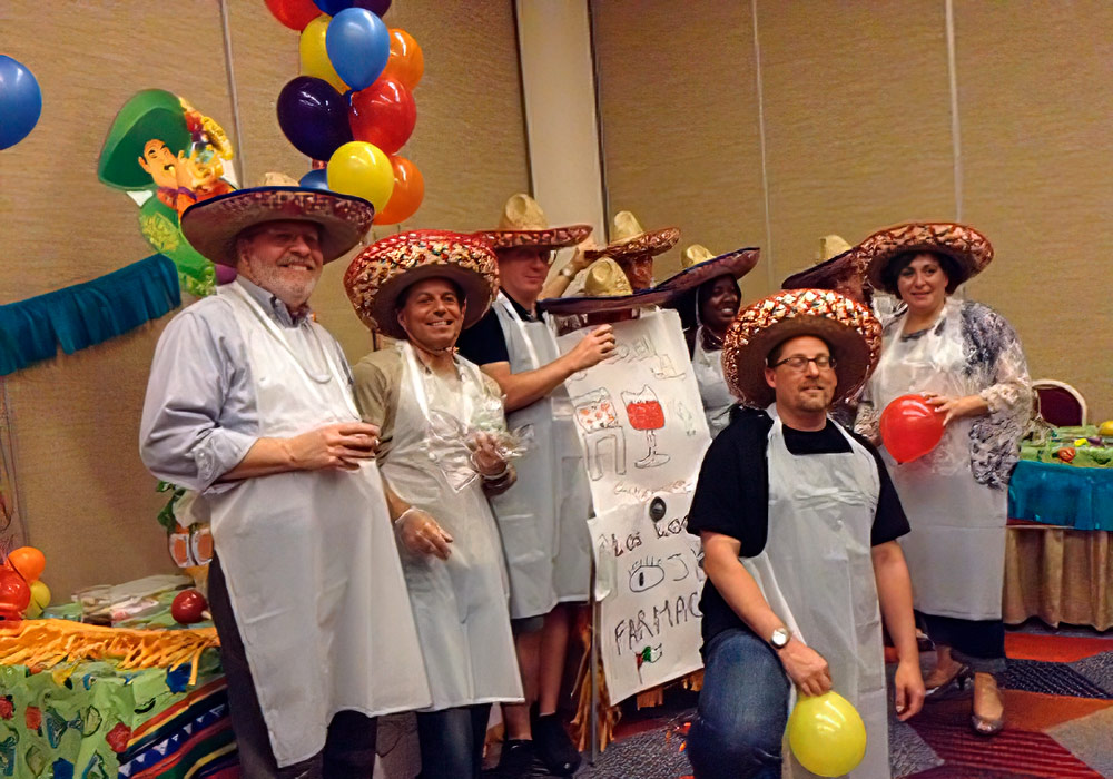 A group of people wearing mexican hats.