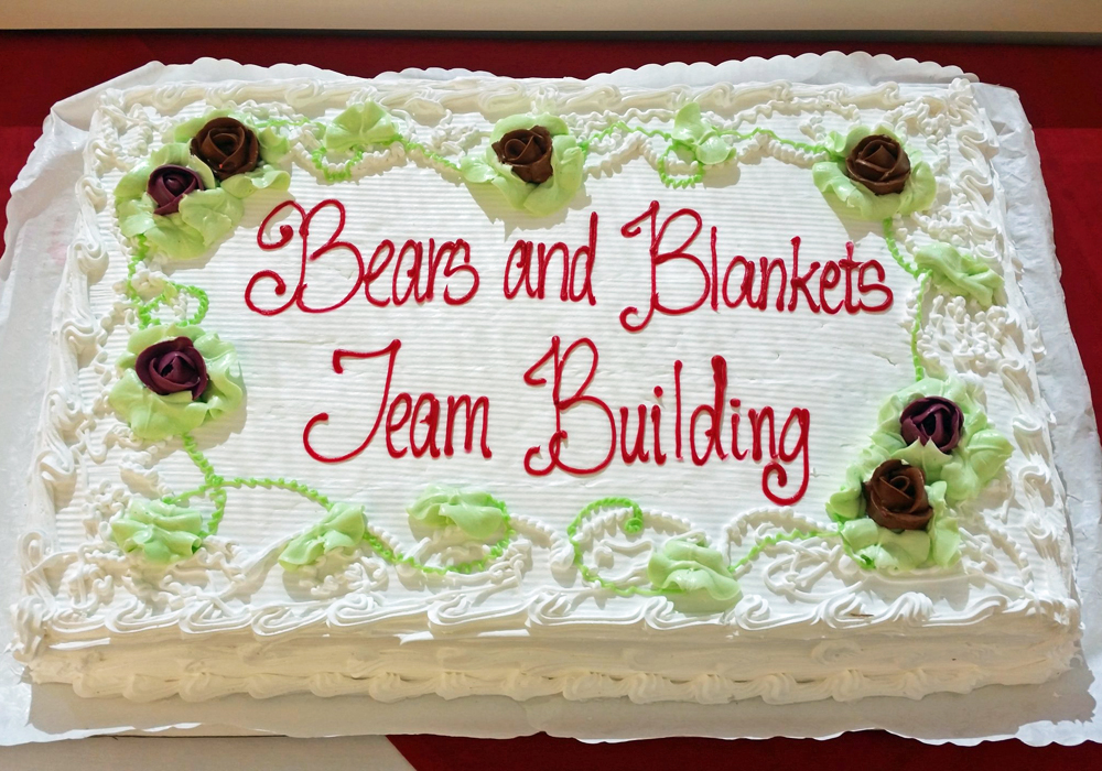 Beavers and blankets team building cake.