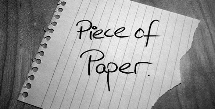 A piece of paper with the word piece of paper written on it.
