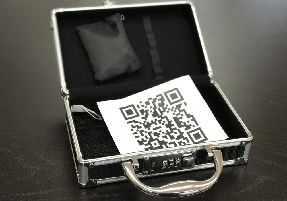 A briefcase with a qr code in it.