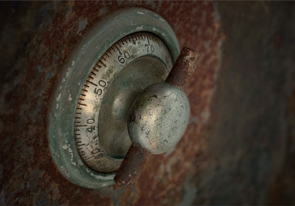 An old rusted lock on a rusty door.