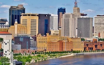 St. Paul skyline with a river in the background, offering the perfect setting for team building activities.